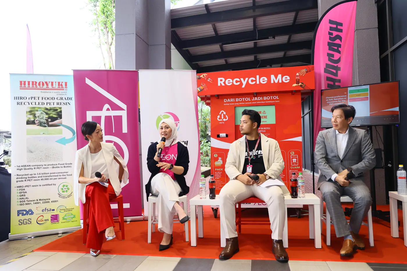 Panel event with sponsor banners — Trash4Cash community recycling forum